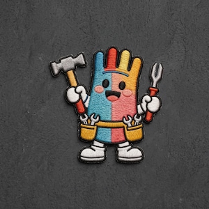 May include: An embroidered patch featuring a cartoon character with a multi-colored body in blue, red, and yellow. The character has white gloved hands holding a gray hammer and a silver screwdriver, wearing a yellow tool belt with small wrenches.