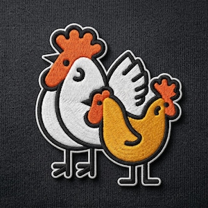 May include: An embroidered patch featuring a large white chicken with an orange comb and a smaller yellow chicken with an orange comb, both outlined in black, set against a dark gray textured fabric background with a white border.