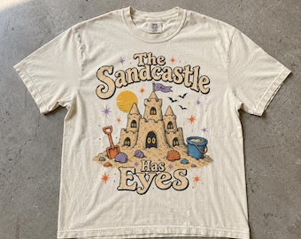The Sandcastle Has Eyes Shirt, Funny Haunted Beach Summerween Sand Castle Illustration 90s Inspired, Comfort Colors