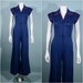 Tiffany Pushkar reviewed Vintage 70s Blue Jersey Zipper Front Disco Jumpsuit, Wide Bell Bottoms Cap Sleeves Fitted Bodysuit XS