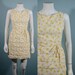 vegaskathi reviewed SALE Vintage 1960s Sweet Sleeveless Floral Day Dress, Yellow Spring Flowers 24" Waist S/XS