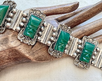 Pulsera mexicana tallada con rostro de ónix verde y plata de ley