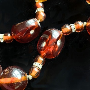 Vintage Swirl Bakelite Beaded Necklace with Rhinestone Accents