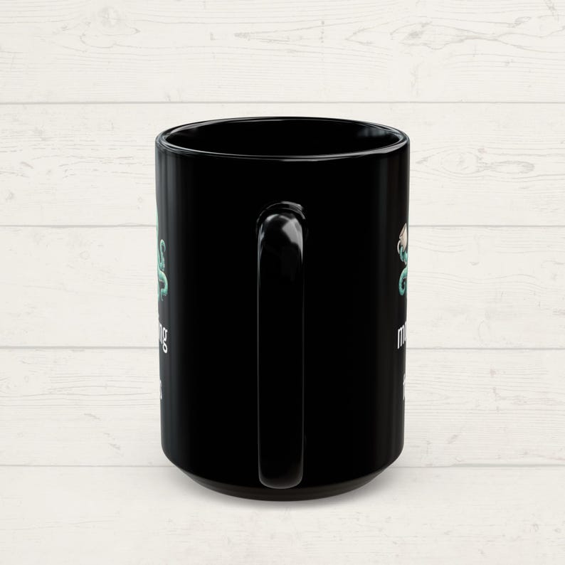 Handle side of a mug showing that the design is on both sides.