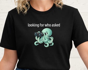 Camiseta con humor seco y sarcástico: Buscando a quien preguntó, con binoculares de pulpo. Regalo divertido para neurospicios.
