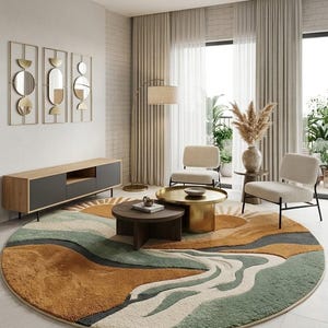 May include: A large circular area rug featuring a textured, abstract landscape design in shades of mustard yellow, sage green, cream, and charcoal gray. The pattern depicts rolling hills and sunburst motifs with a thick, plush pile construction.