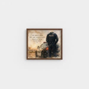 May include: Framed artwork featuring a police officer standing near a police car. The image has a watercolor effect with text that reads, "The shift ends but the stories stay - handle them with care."