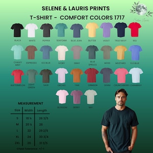Peut inclure: Un nuancier pour les t-shirts Comfort Colors 1717 de Selene & Lauris Prints, pr&eacute;sentant 29 options de couleurs unies avec des noms comme Black, White et Crimson. Un tableau de mesures indique les largeurs et longueurs en cm pour les tailles S &agrave; 2XL.