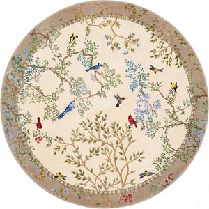 May include: A round area rug with a cream-colored background featuring a detailed design of birds and branches. The rug has a beige border and is adorned with various colorful birds, green leaves, and blue floral accents.