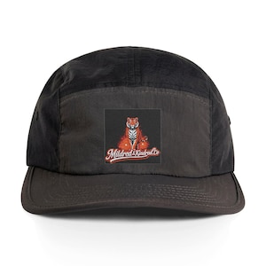 May include: Black five-panel cap with a square patch showing a tiger and cub in orange and red. The patch has the text "Mildred & Kindred Co" in a cursive font. The cap has a curved peak.