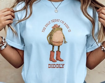 Playful Western Frog Cowboy Tee, Funny "Diddly Squat" Quote Print Light Blue Casual Crew Neck for Humor Lovers