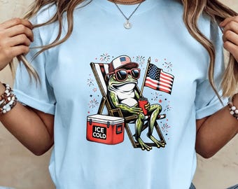 Patriotic Chill Frog 4th of July Tee, Ice Cold Cooler & American Flag Frog Lounging on Beach Chair Print Light Blue Casual Crew Neck Shirt