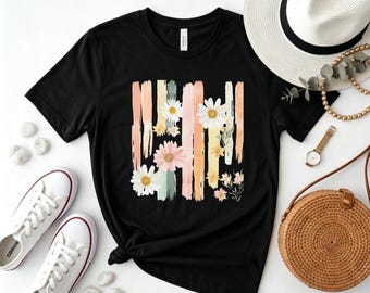 Pastel Brushstroke Daisy Floral Tee, Watercolor Blooms Print Black Crew Neck Shirt for Spring Vibes