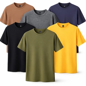 Puede incluir: Colección de seis camisetas de manga corta en varios colores lisos. Los colores incluyen marrón, gris, azul marino, negro, verde oliva y amarillo. Cada camiseta tiene cuello redondo y una pequeña etiqueta cerca del cuello.