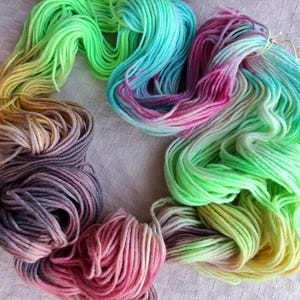All purpose wool yarn worsted weight hand dyed in neon rainbow colors; Rainbow Connection Variations Collection #4
