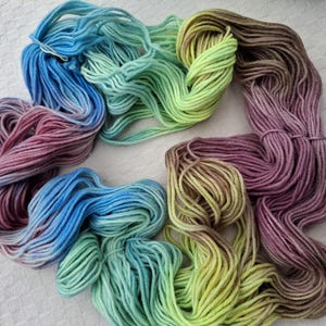 All purpose wool yarn worsted weight hand dyed in muted and neon rainbow colors; Rainbow Connection Variations Collection #3