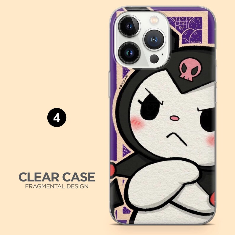 May include: Clear phone case with a cartoon character design. The case features a black and white character with a pink skull on its head, set against a purple and beige background. The text "CLEAR CASE FRAGMENTAL DESIGN" is visible.