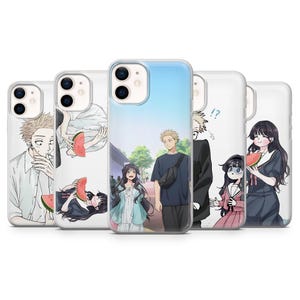 May include: A collection of five phone cases featuring anime-style illustrations. Each case showcases a different design, including characters with watermelon slices and outdoor scenes. The cases are white with black camera surrounds.