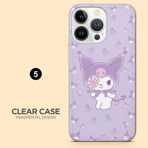 May include: Clear phone case with a purple background featuring a cartoon character holding a heart-shaped lollipop. The case has a repeating pattern of small character faces and cherries. The text "CLEAR CASE FRAGMENTAL DESIGN" is at the bottom.
