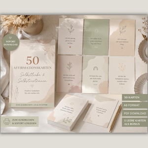 Könnte beinhalten: Ein Set von Affirmationskarten in neutralen Farbtönen, mit einem Buch und einzelnen Karten mit motivierenden Zitaten und botanischen Designs. Das Buch trägt den Titel "50 Affirmationskarten: Selbstliebe & Selbstvertrauen".