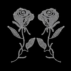 May include: A rhinestone transfer design featuring two symmetrical rose flowers with stems and leaves. The floral pattern is composed of numerous small, clear, reflective crystals arranged to form the outlines and details against a black background.