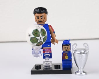 MOC Raphinha Barcelona 25/26  Minifigure - #11 Blaugrana Split Design Home Jersey, Brazilian Dazzler with Big-Ears UCL Trophy