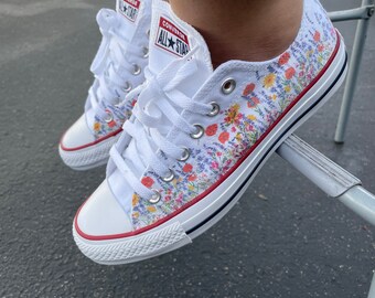 white converse with flowers