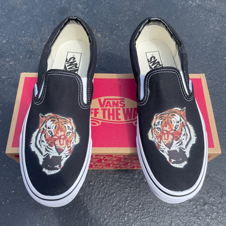 tiger slip on vans