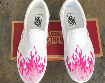white and pink vans