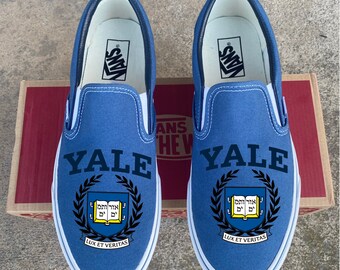 navy blue van slip ons