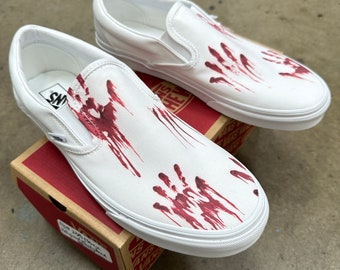 tennis shoes with blood