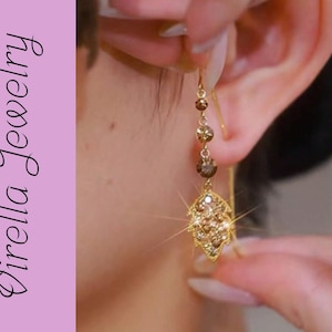 Pendientes hoja dorada con cristales cadena larga estilo threader