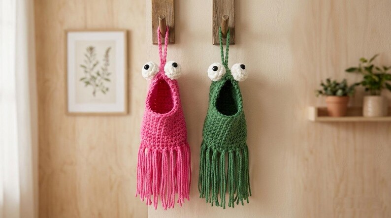 May include: A set of three ceramic mugs with a speckled, matte finish. The mugs are in shades of cream, light gray, and dark gray. Each mug has a simple, minimalist design, perfect for coffee or tea.