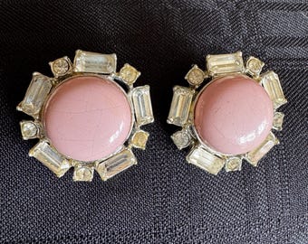 Pink Cabuchon surrounded by rhinestones