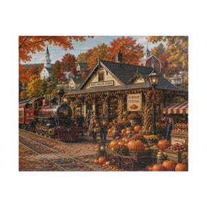 May include: A jigsaw puzzle depicting a steam train at Maple Hollow Station during autumn. The scene features a train on tracks, a building with a Pumpkin Festival sign, numerous orange pumpkins, fall foliage, and a small town in the background.