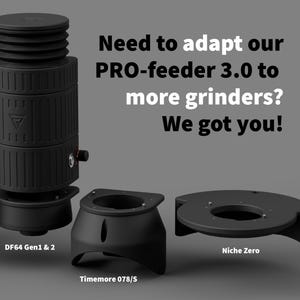 May include: A white ceramic mug with a black handle and the text "But First, Coffee" in a black, handwritten-style font. The mug is on a white surface.