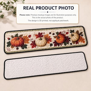 May include: Two rectangular stair treads with black edges. One tread features a 3D printed design of orange and white pumpkins surrounded by autumn leaves and berries on a cream background. The other tread is plain white with a textured surface.