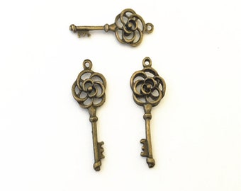 25pcs de charme antique de pendentif de clef de fleur de bronze 11mmx25mm