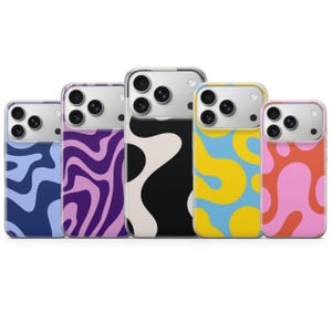 May include: Five colorful phone cases with abstract wavy patterns. The cases feature designs in navy blue, purple, black and cream, yellow and blue, and pink and orange. Each case has a clear border and a camera cutout.