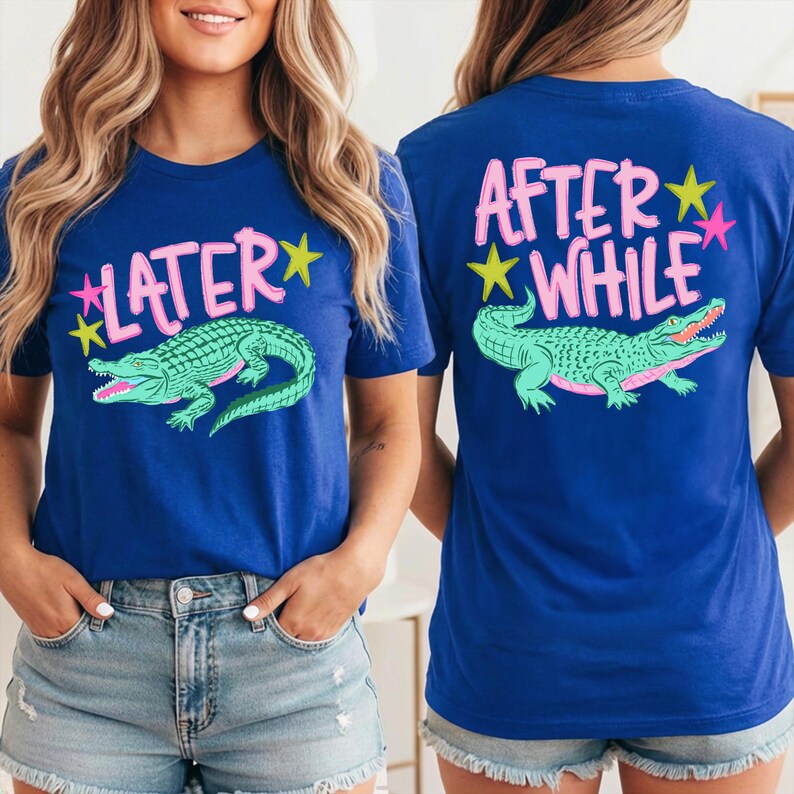May include: Blue t-shirts with a graphic of a green alligator and the text "LATER" on the front and "AFTER WHILE" on the back. The text is in pink with yellow and pink star accents.