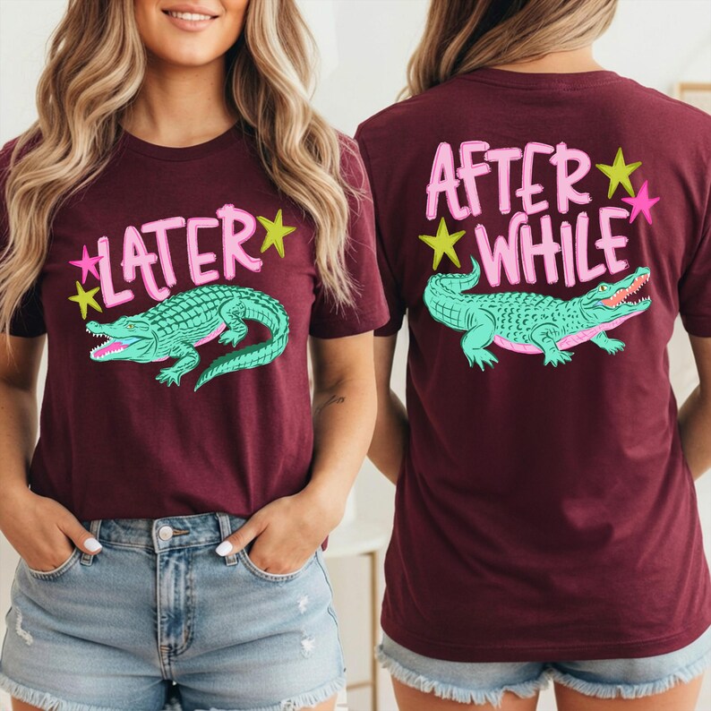 May include: Burgundy t-shirts with a teal alligator graphic. The front of the shirt says "LATER" in pink with yellow stars. The back of the shirt says "AFTER WHILE" in pink with yellow and pink stars.