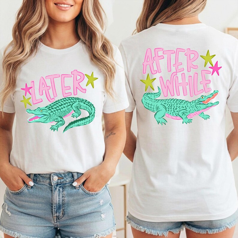 May include: White t-shirts with a front and back design. The front says "LATER" with a green alligator graphic. The back says "AFTER WHILE" with a matching alligator graphic. Both designs include pink text and yellow and pink star accents.