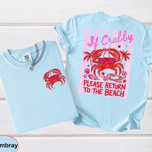 Front pocket graphic of a crab with sunglasses. The back features a large red crab, pink stripes, palm trees, and the funny quote "If Crabby PLEASE RETURN TO THE BEACH".