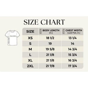 May include: A t-shirt size chart with measurements in inches. The chart includes sizes XS to 2XL, detailing body length and chest width. The text "SIZE CHART" is at the top.