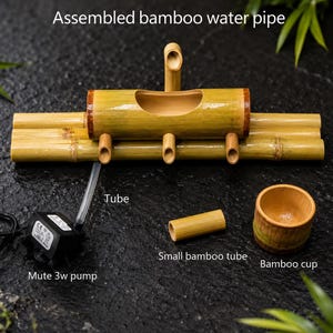 May include: Assembled bamboo water pipe with a mute 3w pump, tube, small bamboo tube, and bamboo cup. The main structure is made of bamboo, featuring a central trough and multiple spouts. The text "Assembled bamboo water pipe" is visible.