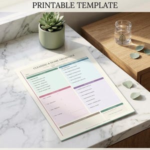 May include: A printable cleaning and home organiser template, page 2, with a pastel colour scheme. The template includes sections for daily, weekly, and monthly tasks. The text reads: "Designed for your complete home refresh & focus. Instant Digital Download."