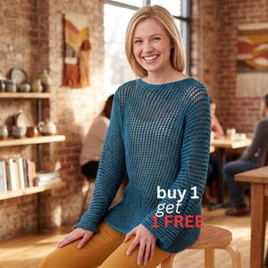May include: A woman wearing a teal, open-weave sweater with long sleeves and a round neckline. She is sitting on a wooden stool, wearing mustard-colored pants. The text "buy 1 get 1 FREE" is visible in red.