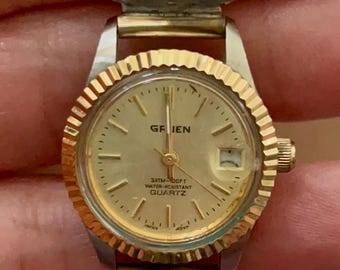 Reloj antiguo de estilo navajo, nativo americano. Piedras de turquesa y coral con hojas de oro de 12 quilates.