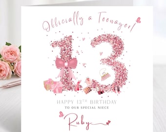 May include: A white birthday card with the text "Officially a Teenager!" and "Happy 13th Birthday to our special niece Ruby". The number 13 is in pink glitter with a bow, gifts, and makeup.