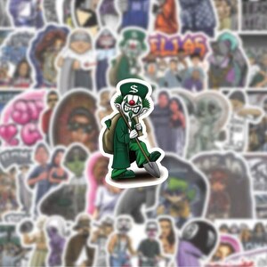 May include: A sticker featuring a green clown character with a dollar sign on its hat, carrying a shovel and a sack of money. The clown has a red nose and a sinister grin. The sticker is surrounded by other stickers.